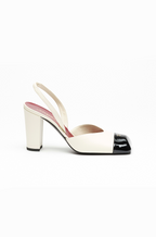 CHANEL “Élégance Bicolore” Cap-Toe Slingback Pumps