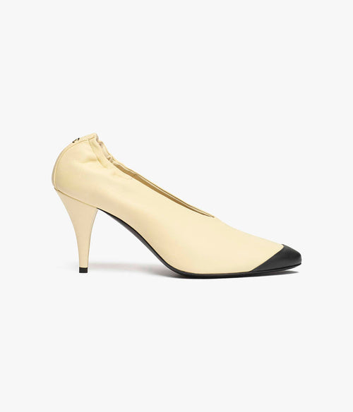 CHANEL Sculpted Cap-Toe Pumps