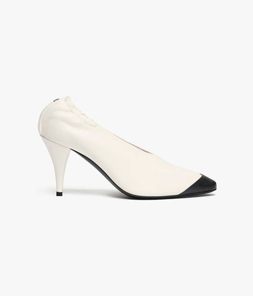 CHANEL Sculpted Cap-Toe Pumps
