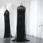 Che’ Le Vout” Embellished Noir Cape Gown – Velour de Luxe Award Couture
