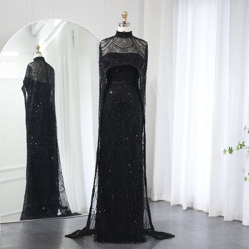 Che’ Le Vout” Embellished Noir Cape Gown – Velour de Luxe Award Couture
