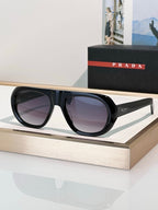 Prada “Linea Sportiva” Oversized Oval Sunglasses – Modern Edge Collection