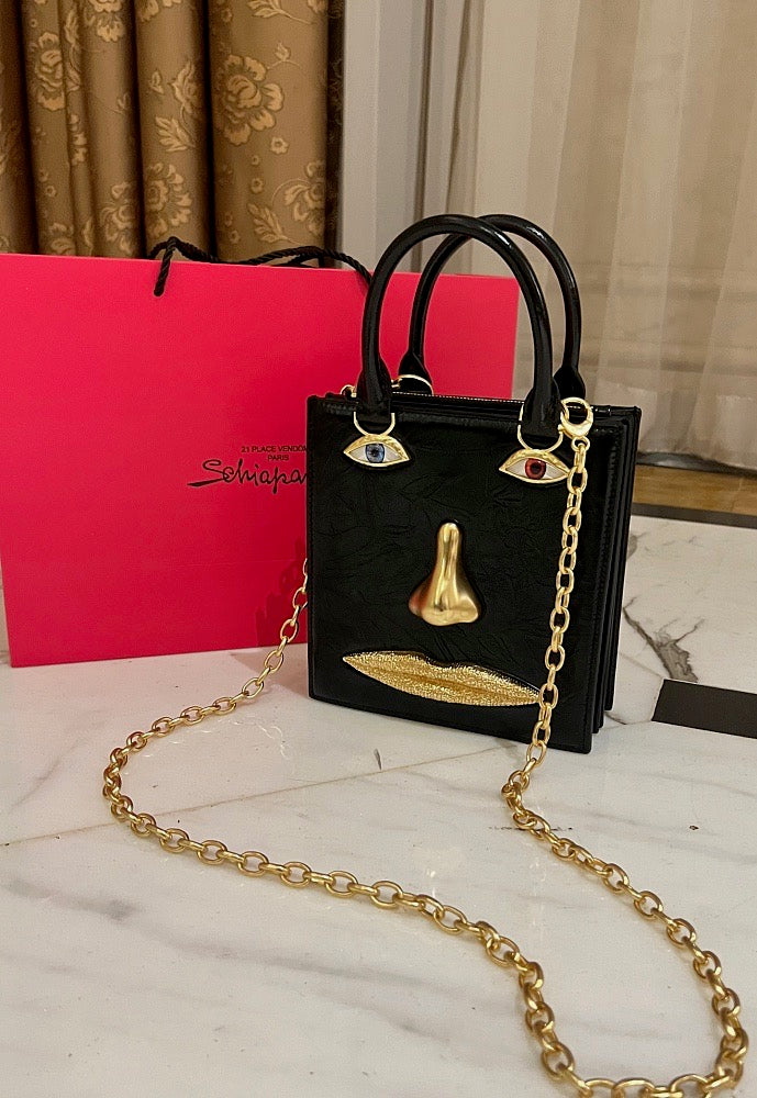 Visage d'Or” Face Bag by Schiaparelli – LUXE LIVING FASHIONS