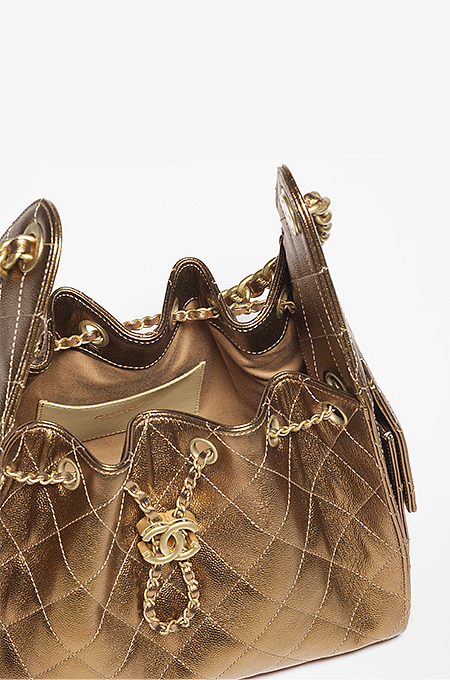 Chanel 25 “Gilded Quilts” Drawstring Bag in Metallic Gold