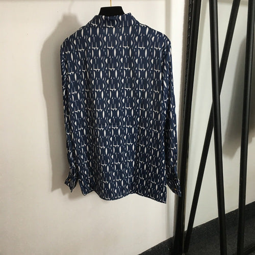 “Fleur Éblouissante” Embellished Jacquard Blouse by Miss Dior