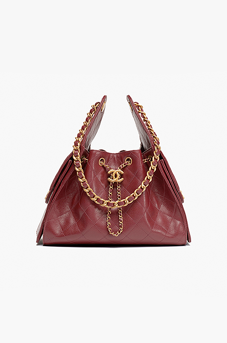 Chanel “Rouge Caviar” Mini Bucket Flap Bag Mini Edition in