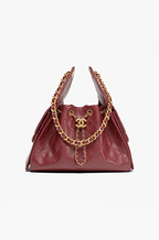 Chanel “Rouge Caviar” Mini Bucket Flap Bag Mini Edition in Bordeaux Caviar Calfskin with Gold Hardwar
