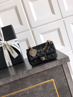 Chanel Pearl Heart Charm Mini Flap Bag in Quilted Lambskin with Gold-Tone Hardware