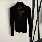 Prada “Milano Luxe Sculpt” Ribbed Turtleneck Knit —