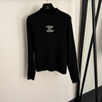 Chanel “Élégance Ligne” Monogram Knit Sweater