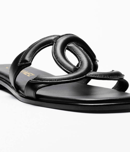 Chanel – Noir Entrelacé CC Flat Sandals