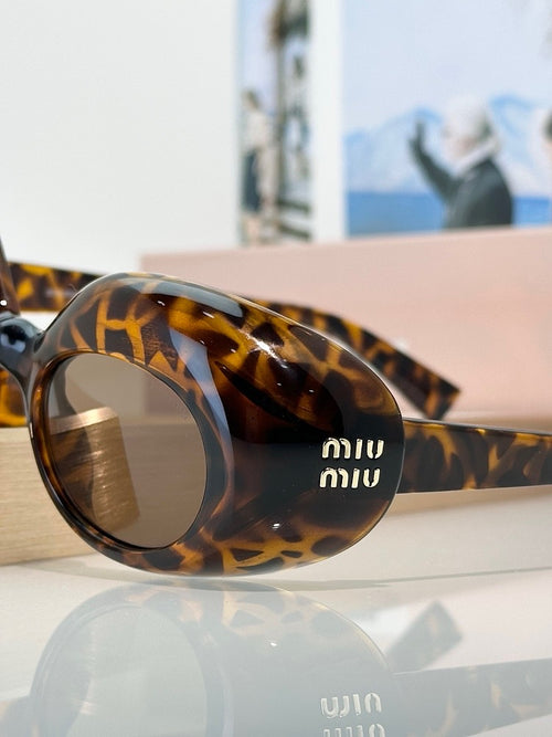Miu Miu “Ovale Couture” Tortoise Acetate Sunglasses