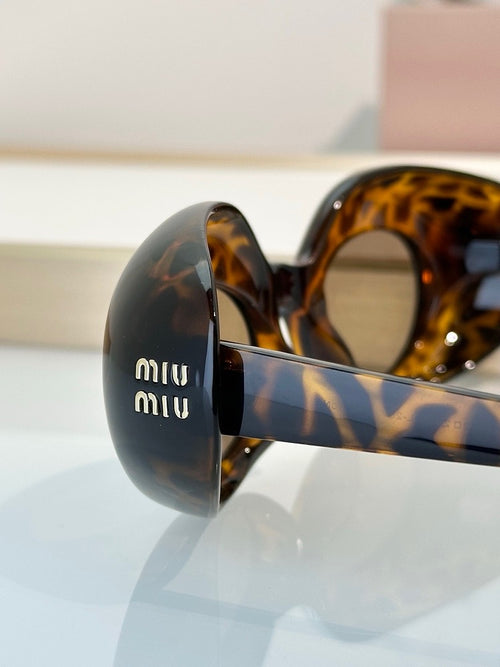 Miu Miu “Ovale Couture” Tortoise Acetate Sunglasses