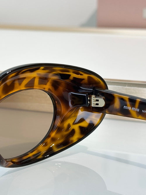 Miu Miu “Ovale Couture” Tortoise Acetate Sunglasses