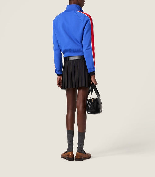 Miu Miu “École Élitaire” Pleated Mini Skirt