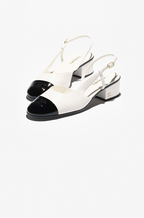 Chanel Épure Slingback Pumps – Blanc & Noir Low Heel Edition