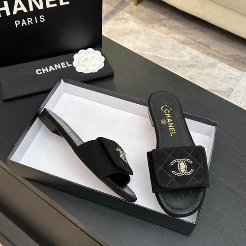 Chanel Quilted Canvas Slides – Noir Classique