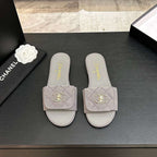 Chanel Quilted Canvas Slides – Sable Élégance