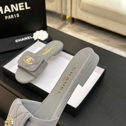 Chanel Quilted Canvas Slides – Sable Élégance