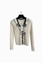 Schiaparelli Rosette Ruffle-Trim Couture Knit Cardigan – Ivory & Noir (One Size