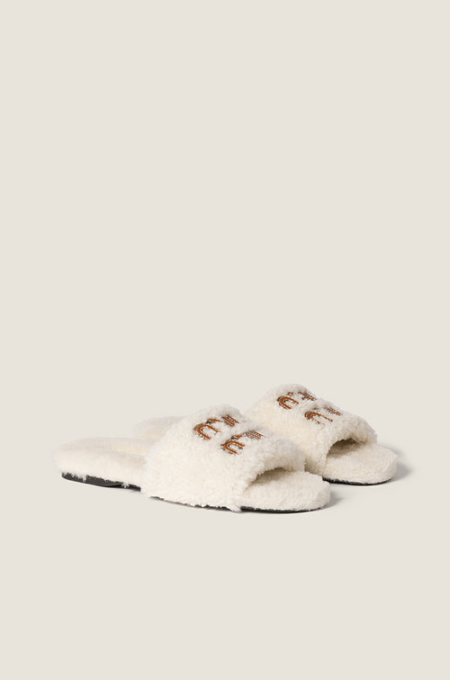 Miu Miu Shearling Logo Slide Slippers in Ivory