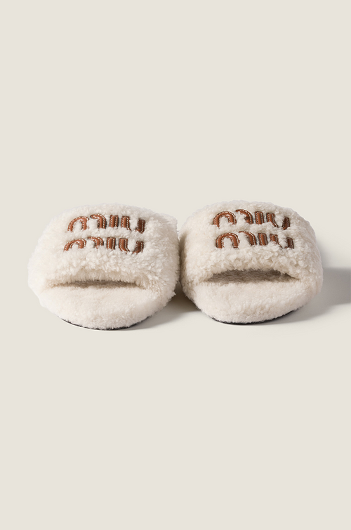 Miu Miu Shearling Logo Slide Slippers in Ivory