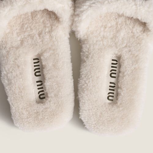 Miu Miu Shearling Logo Slide Slippers in Ivory