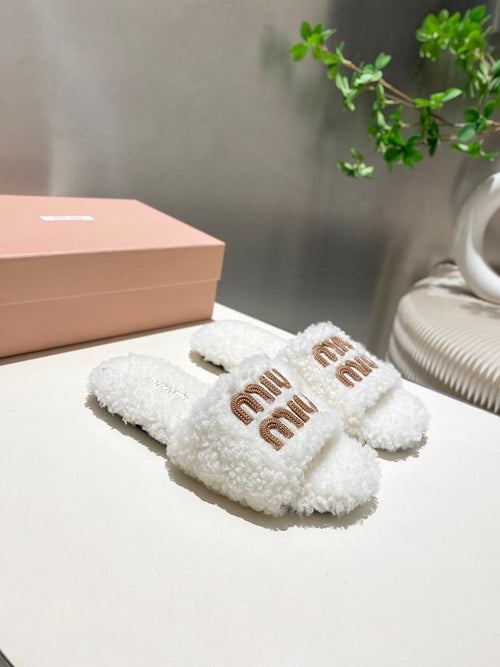 Miu Miu Shearling Logo Slide Slippers in Ivory
