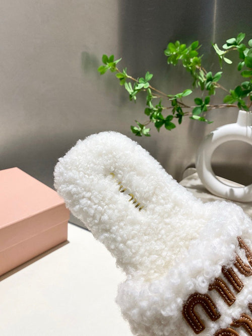 Miu Miu Shearling Logo Slide Slippers in Ivory