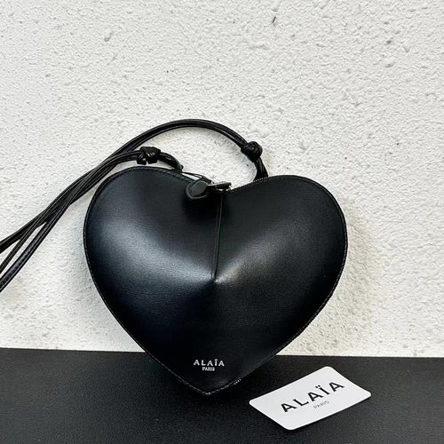 Alaïa Paris Heart-Shaped Patent Leather Crossbody Bag