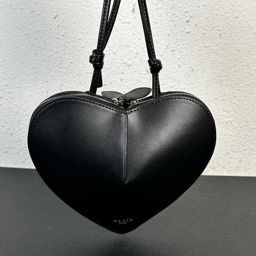 Alaïa Paris Heart-Shaped Patent Leather Crossbody Bag