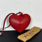 Alaïa Paris Heart-Shaped Patent Leather Crossbody Bag