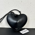 Alaïa Paris Heart-Shaped Patent Leather Crossbody Bag