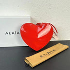 Alaïa Paris Heart Studded Leather Crossbody Bag