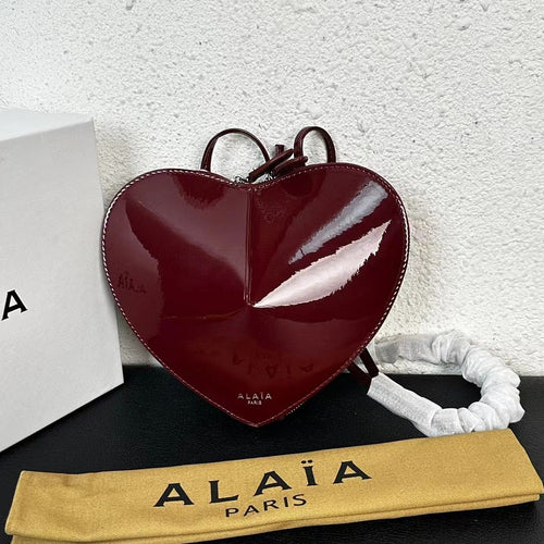 Alaïa Paris Heart Studded Leather Crossbody Bag