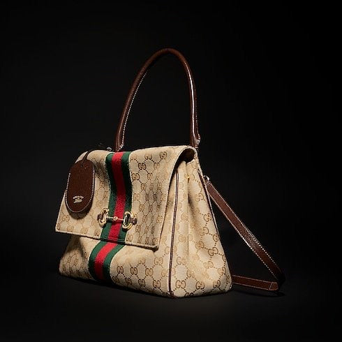 Gucci “Paparazzo” Medium Top Handle Bag