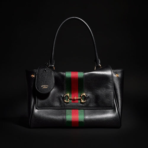 Gucci “Paparazzo” Medium Top Handle Bag