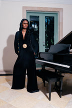 Schiaparelli Muse Velvet Halter Jumpsuit with Gold Medallion