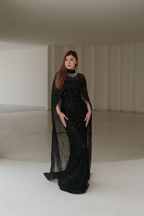 Che’ Le Vout” Embellished Noir Cape Gown – Velour de Luxe Award Couture