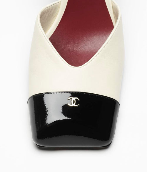 CHANEL “Élégance Bicolore” Cap-Toe Slingback Pumps
