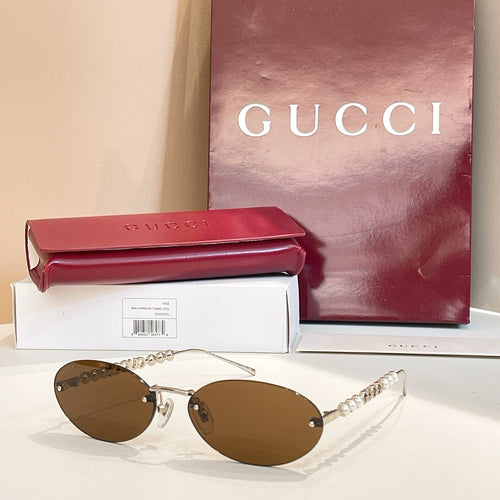 Gucci Perla Oval Rimless Sunglasses