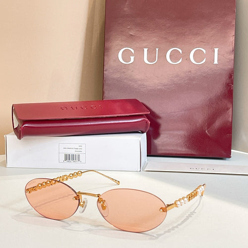 Gucci Perla Oval Rimless Sunglasses
