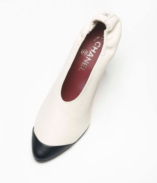CHANEL Sculpted Cap-Toe Pumps