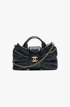 Chanel Bow Quilted Flap Bag – Black Lambskin with Gold Hardware