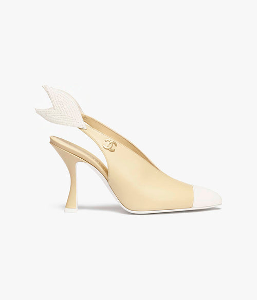 CHANEL Métiers d’Art 2026 “Aile de Camélia” Cap-Toe Slingback Pumps – Ivory &amp; Blanc