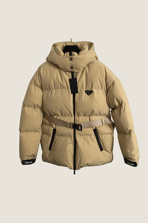 Prada “Lunaris Belted Puffer Jacket” – Luxe Winter Edition