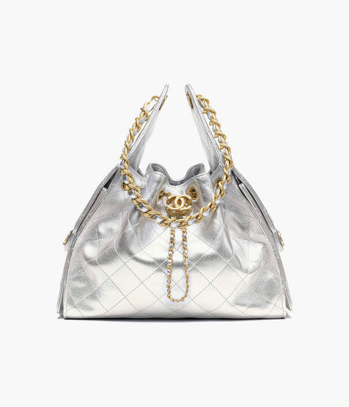 Chanel 25 “Argent Matelassé” Metallic Calfskin Drawstring Bag