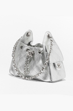 CHANEL 25 “Argent Matelassé” Metallic Calfskin Drawstring Mini Bag
