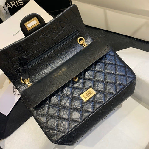 Chanel Classic 2.55 Reissue Flap Bag in Aged Calfskin with Gold-Tone Hardware