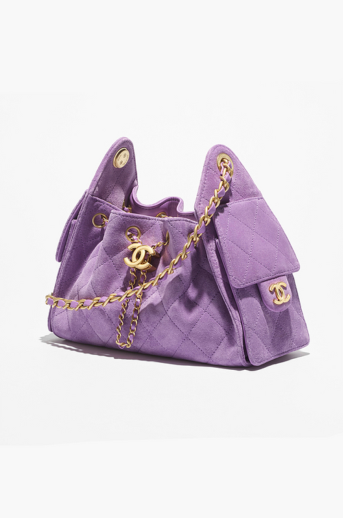 Chanel “Éclat Lavande” Suede Quilted Drawstring Mini Bag